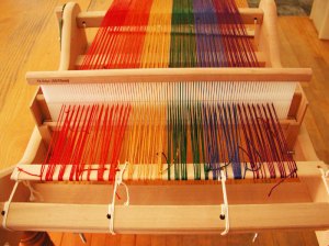 Photo of rigid heddle loom with 2 warping errors.
