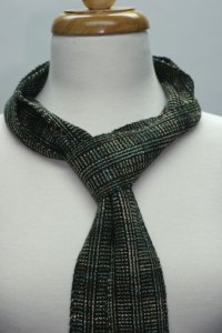 Narrow-log-cabin-scarf Photo of narrow woven scarf, black and varigated