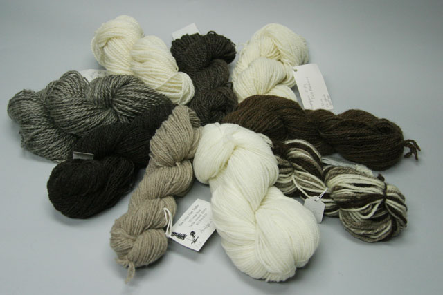 Handspun yarns- different sizes, different colors, different weights. Photo of a variety of handspun yarns, different sizes, different colors, different weights.