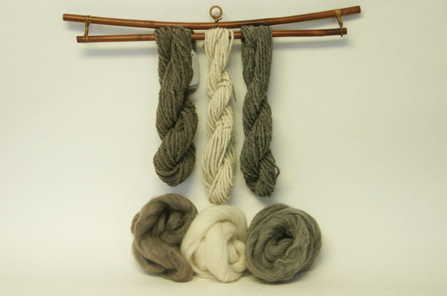 Photo of 3 skeins of yarn and their starting fibers, handspun by Joanne Littler, Pine Ledge Fiber Studio, Fairfax, VT