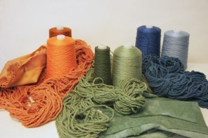photo of fabric and yarn dyed to match commercial yarn colors