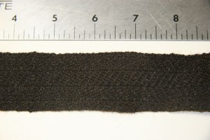 photo of twill tape used as binding on multi-color rug, handspun and handwoven by Joanne Littler, Pine Ledge Fiber Studio, Fairfax, VT