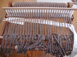 photo showing Ashford's 2.5 dent rigid heddle reed warped with super bulky handspun yarn
